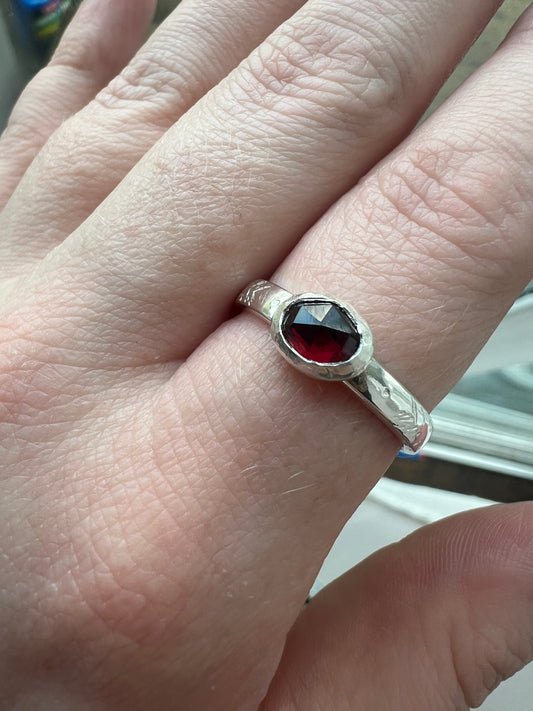 garnet east to west ring