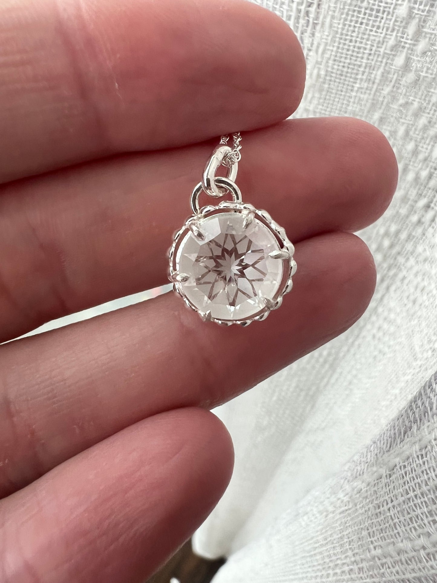 round himalayan crystal pendant